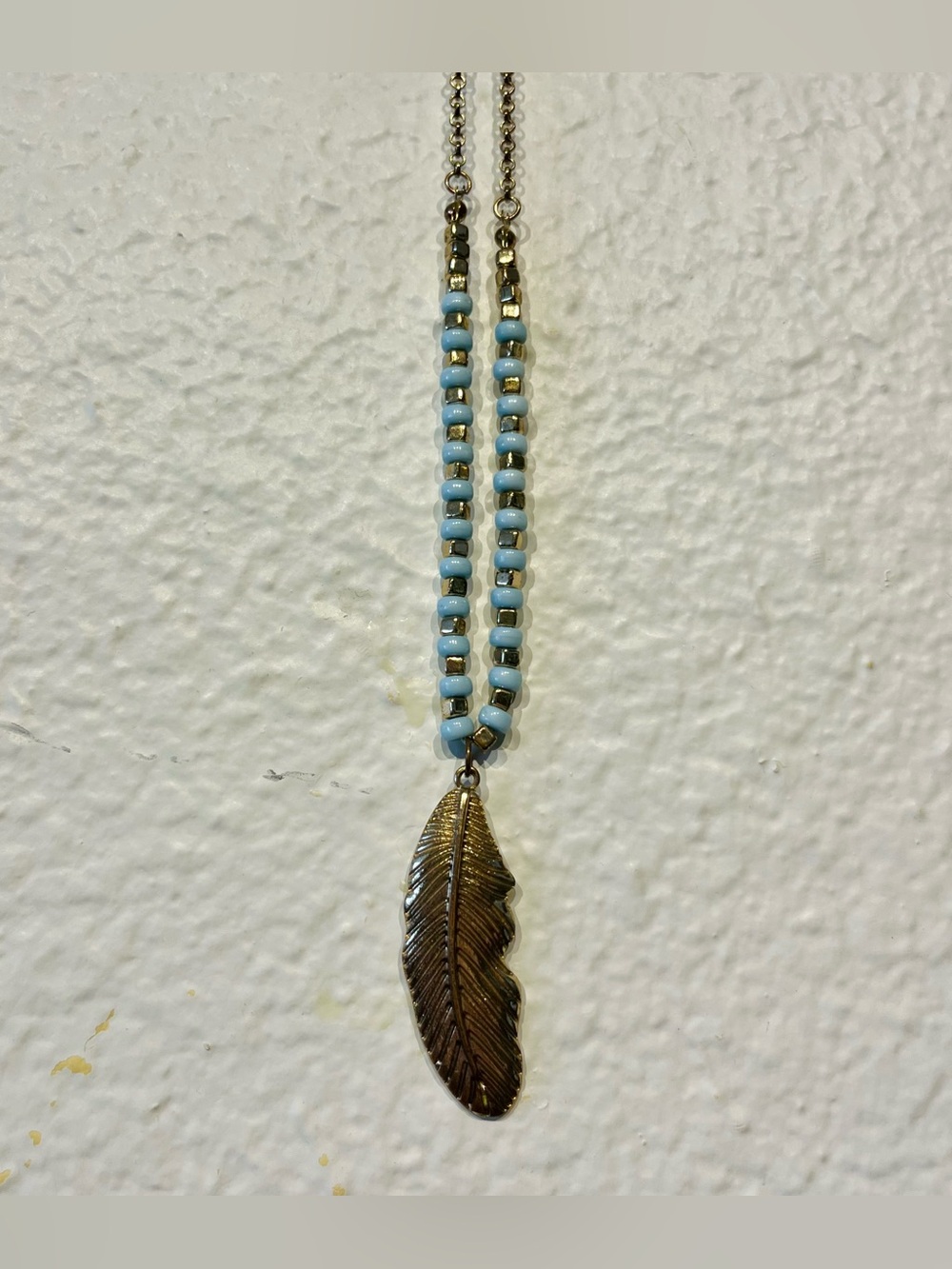 Vintage Y2K Gold Feather Pendant Necklace with Light Blue Accent Beads